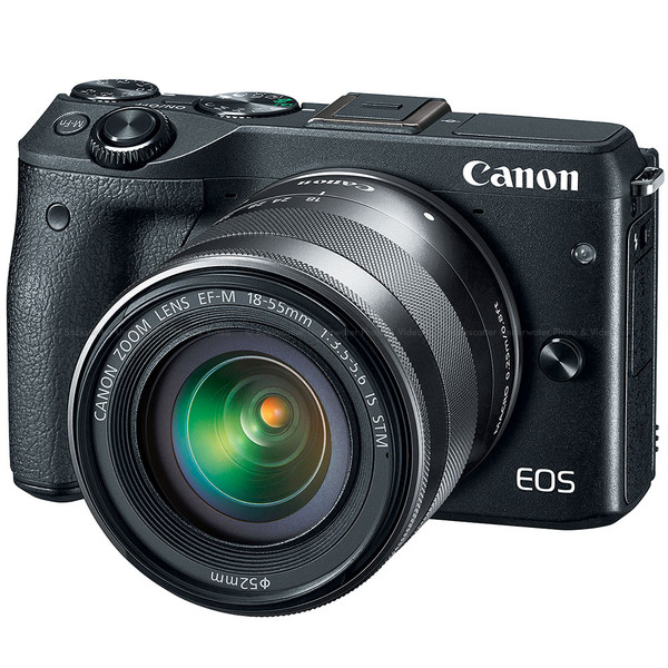 A Canon EOS M camera in front of a white background