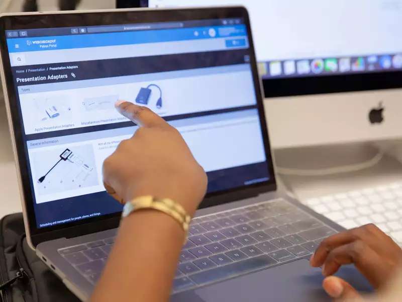 student pointing out equipment on patrol portal home page